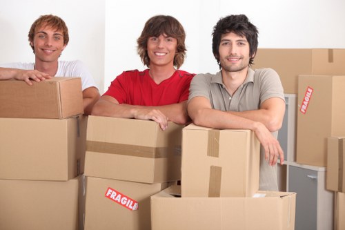 Handling office furniture and boxes during a commercial move in central London