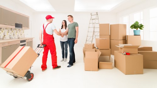 Furniture and boxes being transported by removal van in central London
