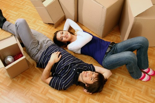 Careful loading of a piano van for central London removals near Bloomsbury